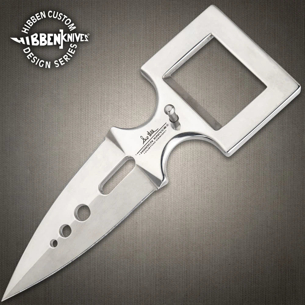 Hidden belt buckle knife open showing 3.25 inch stainless steel blade tucked discreetly