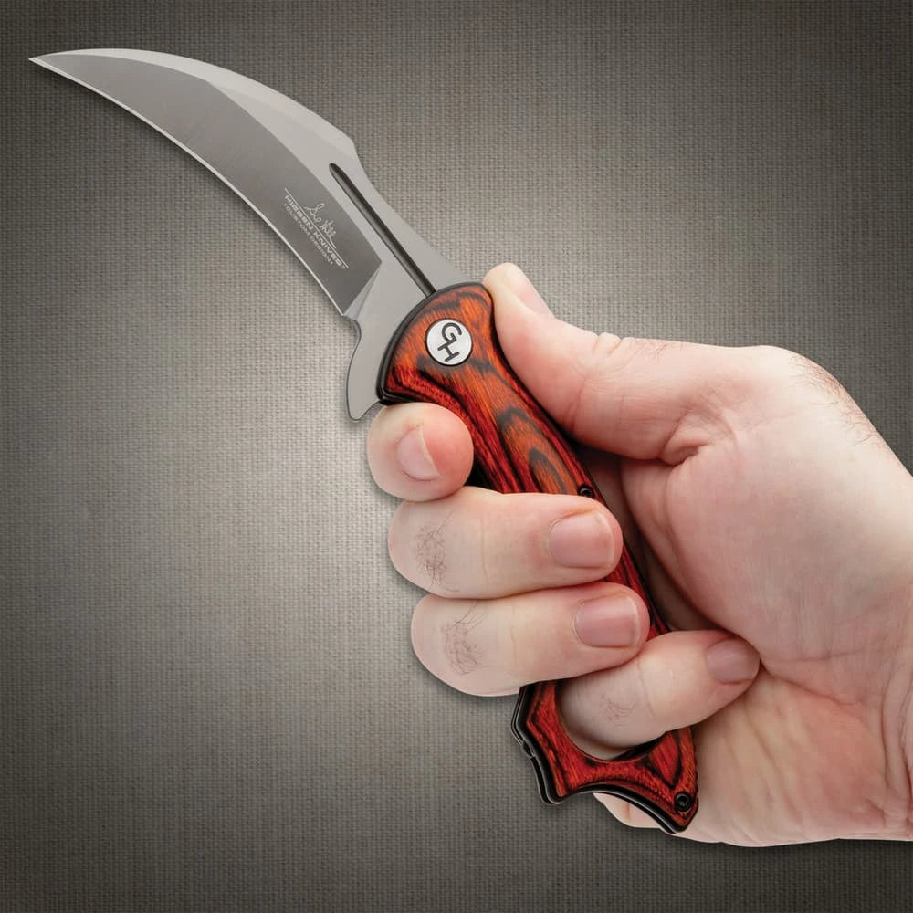 Elite Hibben Warbird folding karambit deployed view