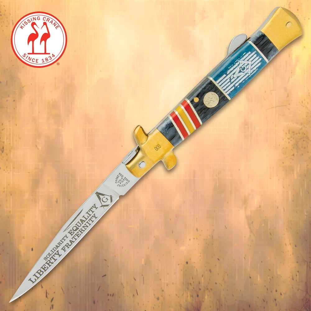 Limited Kissing Crane Mason Stiletto Knife open showing 4 inch mirror polished blade with laser etched Freemasonry artwork