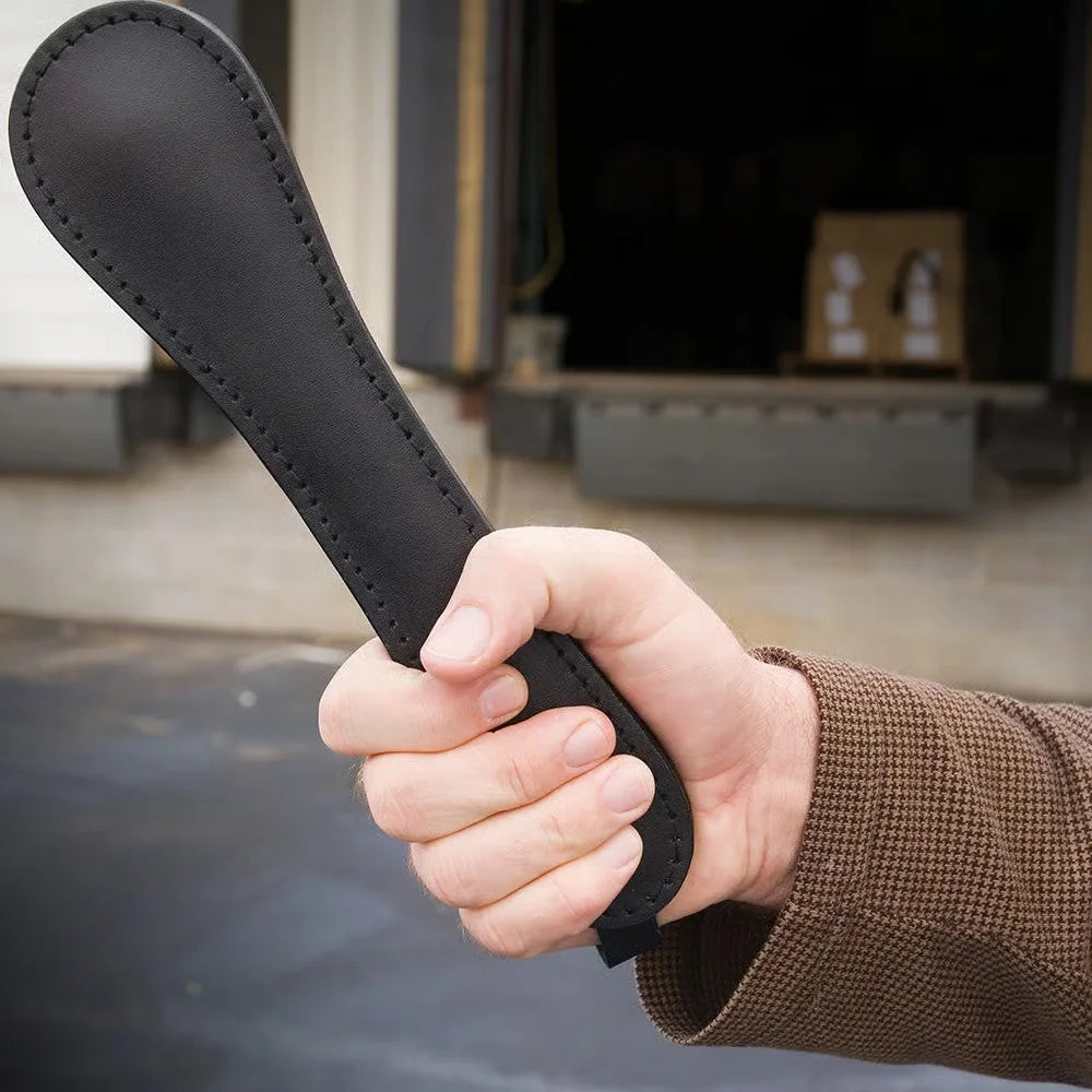 Premium Personal Self-Defense Leather Slapper Replica with strap.
