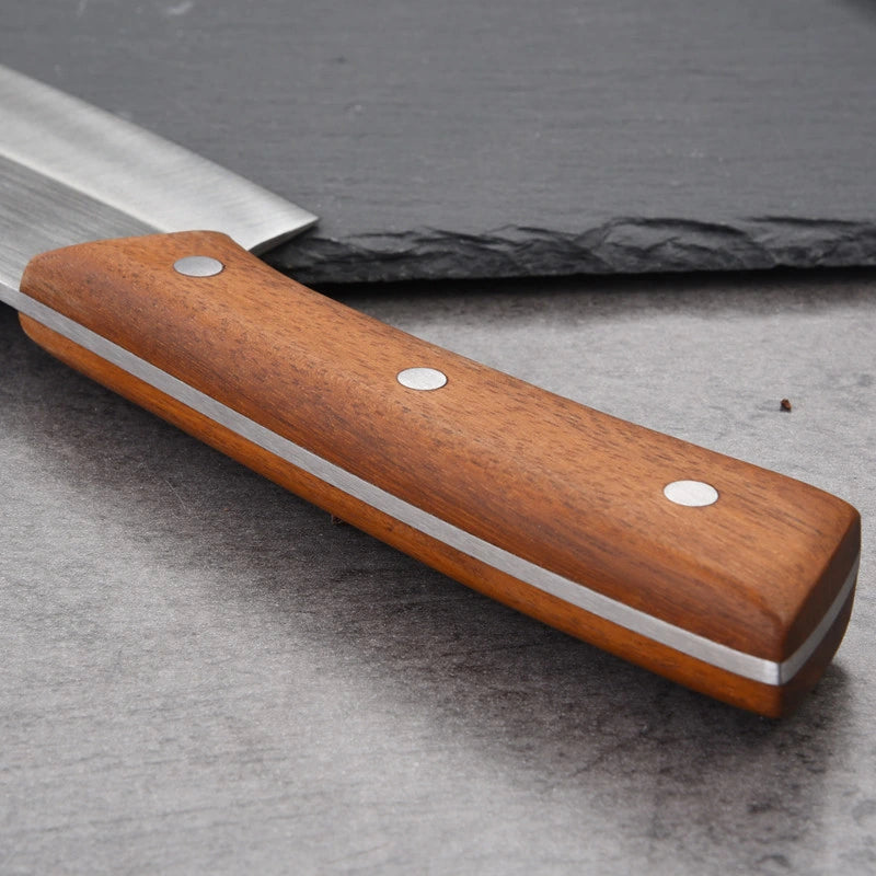 Ergonomic wood handle grip on professional stainless steel knife