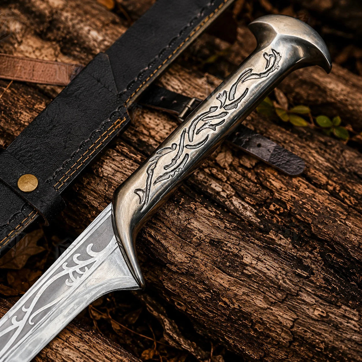 Universal Image Alt Text: Thranduil Sword Hobbit LOTR elven display replica with polished silver engraved blade and black display sheath with strap.