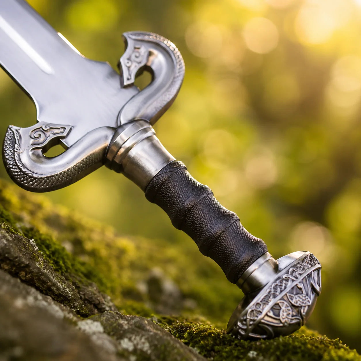 Eowyn Sword Lord of the Rings display replica collectible with silver and gold-tone fantasy styling, dark handle, and collectible Rohan decor presentation
