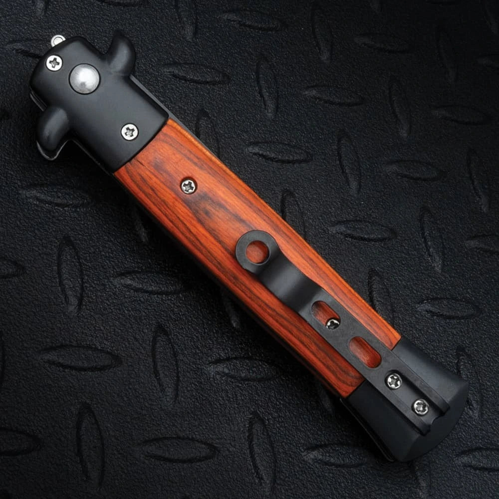 Gangster's edge automatic stiletto knife closed with wood inlay handle and stainless steel construction