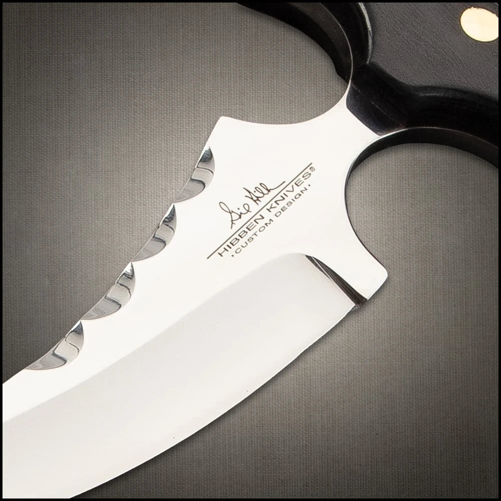 Gil Hibben Vulcan push dagger full view with black pakkawood handle and mirror polished blade