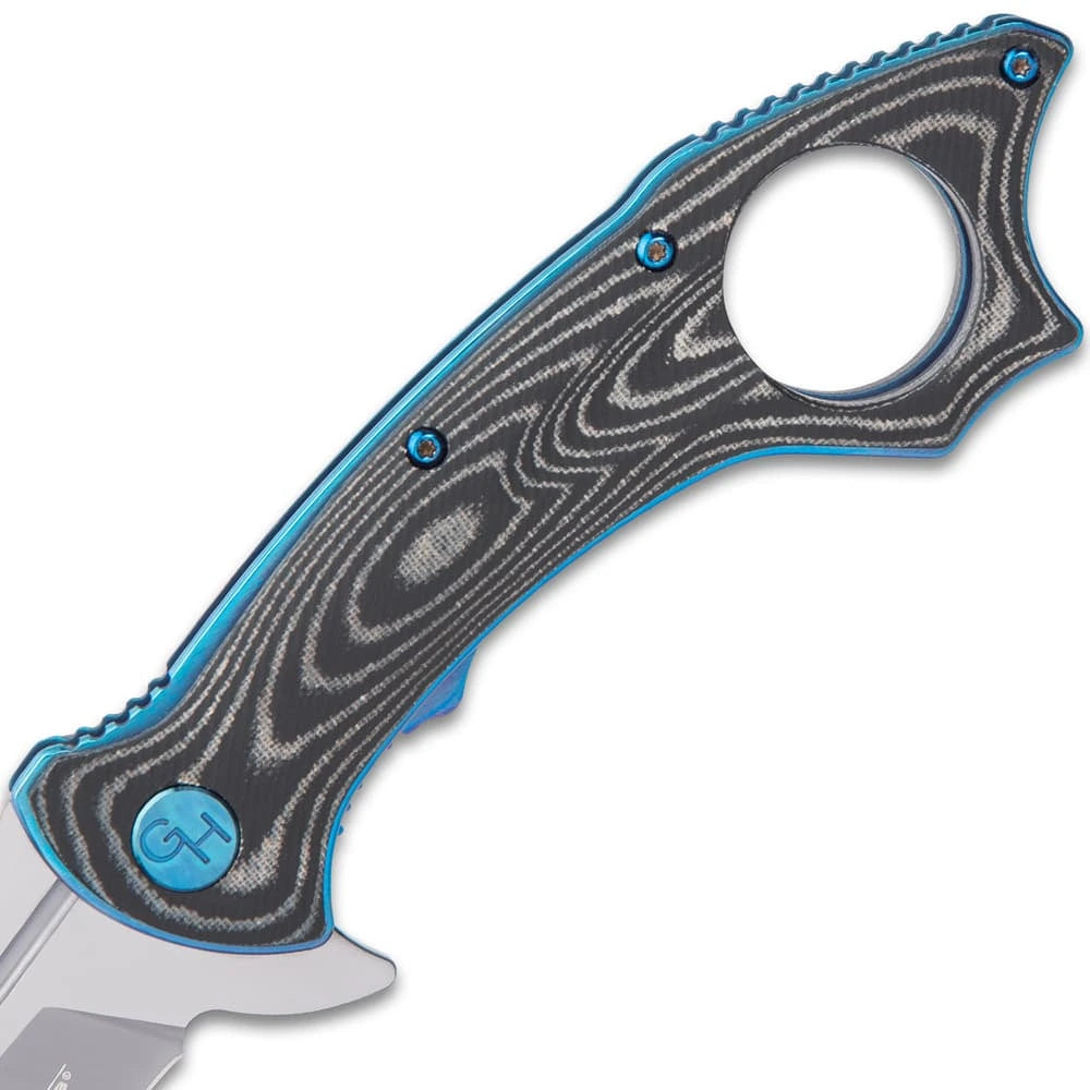 Elite Hibben Warbird folding karambit deployed view