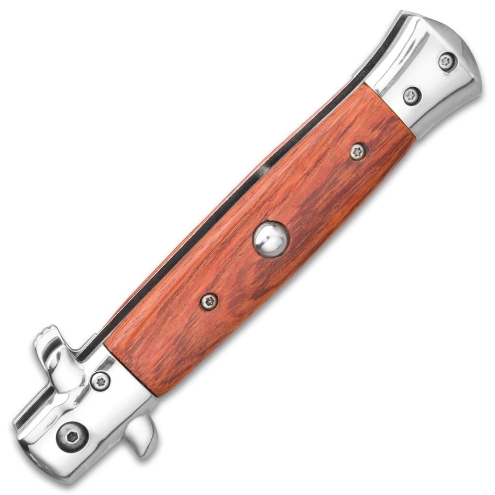 German assisted stiletto pocket knife closed with wooden handle and stainless bolsters