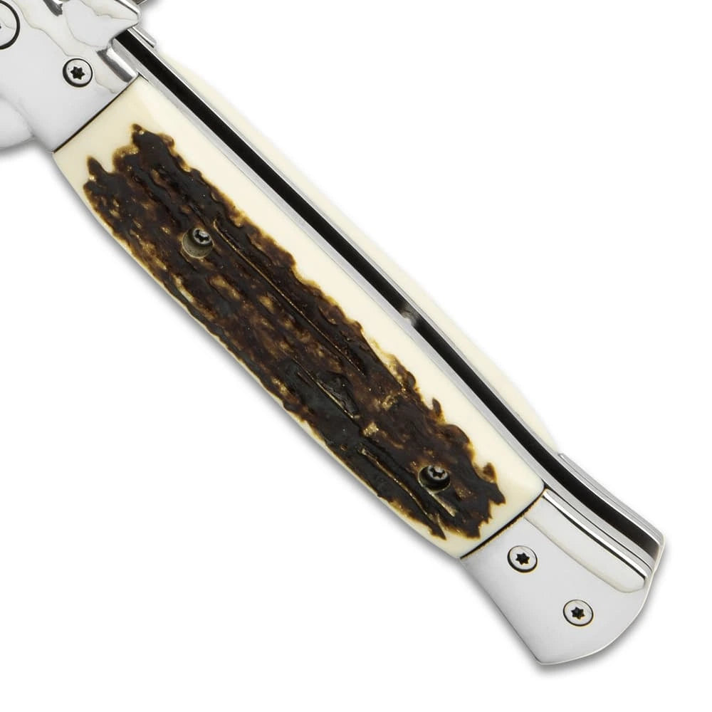 German assisted stiletto pocket knife closed with wooden handle and stainless bolsters