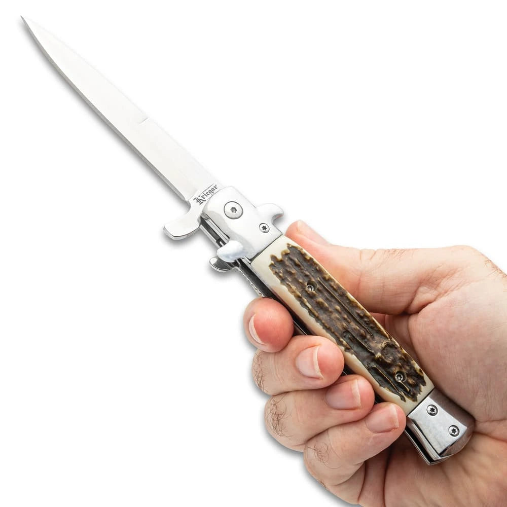 German assisted stiletto pocket knife closed with wooden handle and stainless bolsters