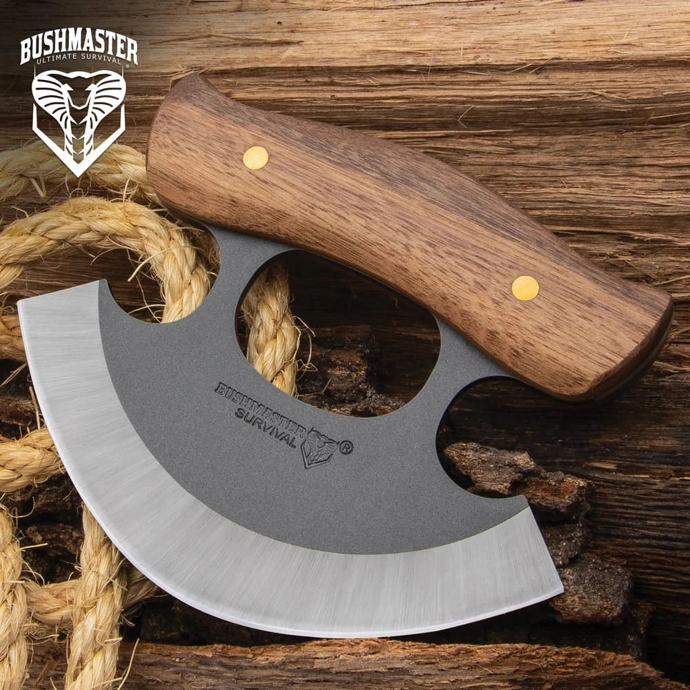 Rough-forged curved blade closeup Bushmaster ulu