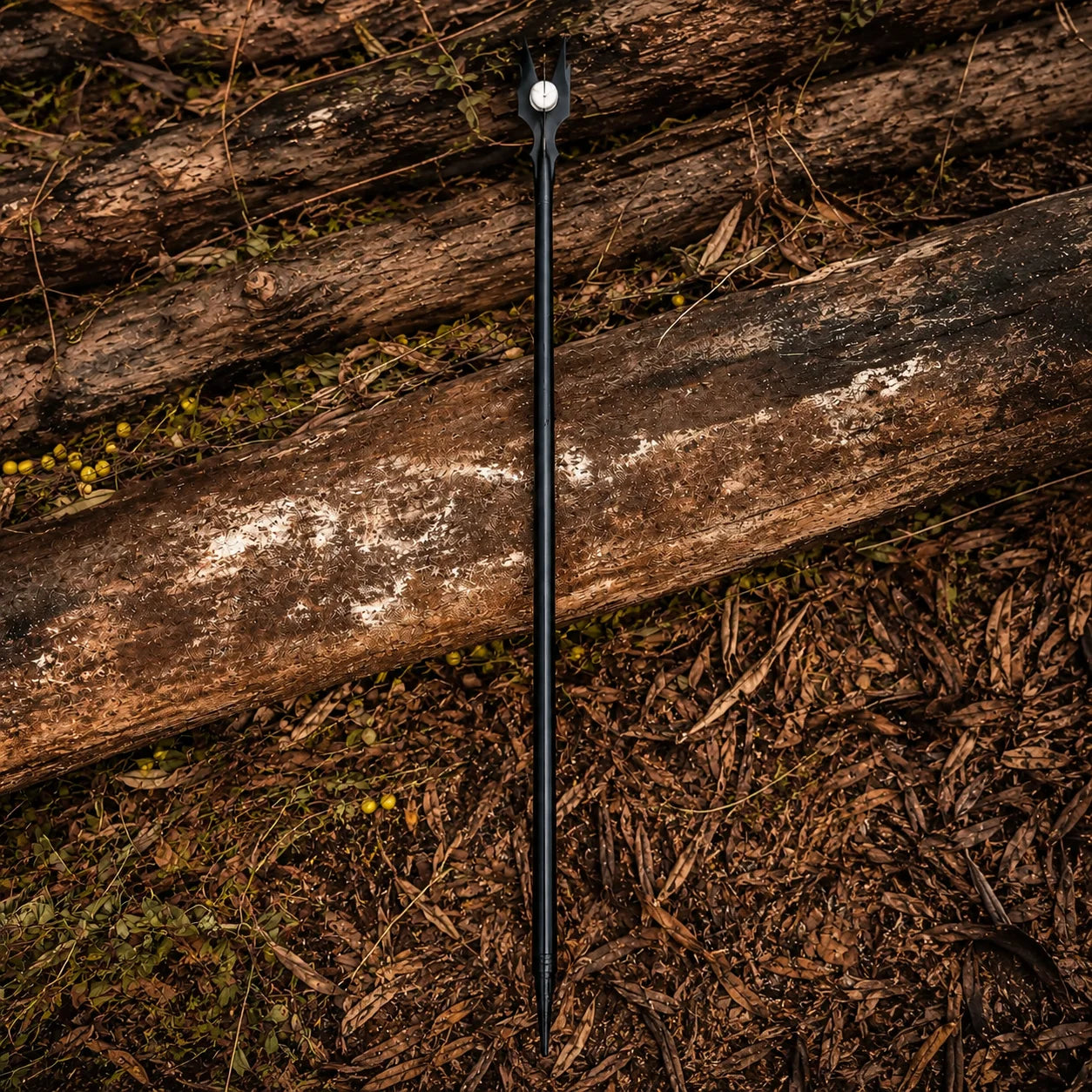 Saruman staff LOTR display replica in sleek black with four-pronged crown and white orb for fantasy collectible decor.