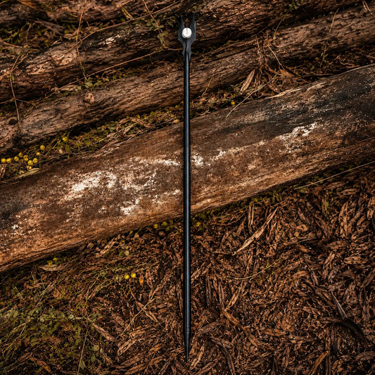 Saruman staff LOTR display replica in sleek black with four-pronged crown and white orb for fantasy collectible decor.