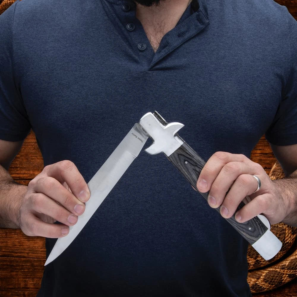 Monster gray pakkawood stiletto pocket knife closed with massive 18 inch overall length and stainless bolsters