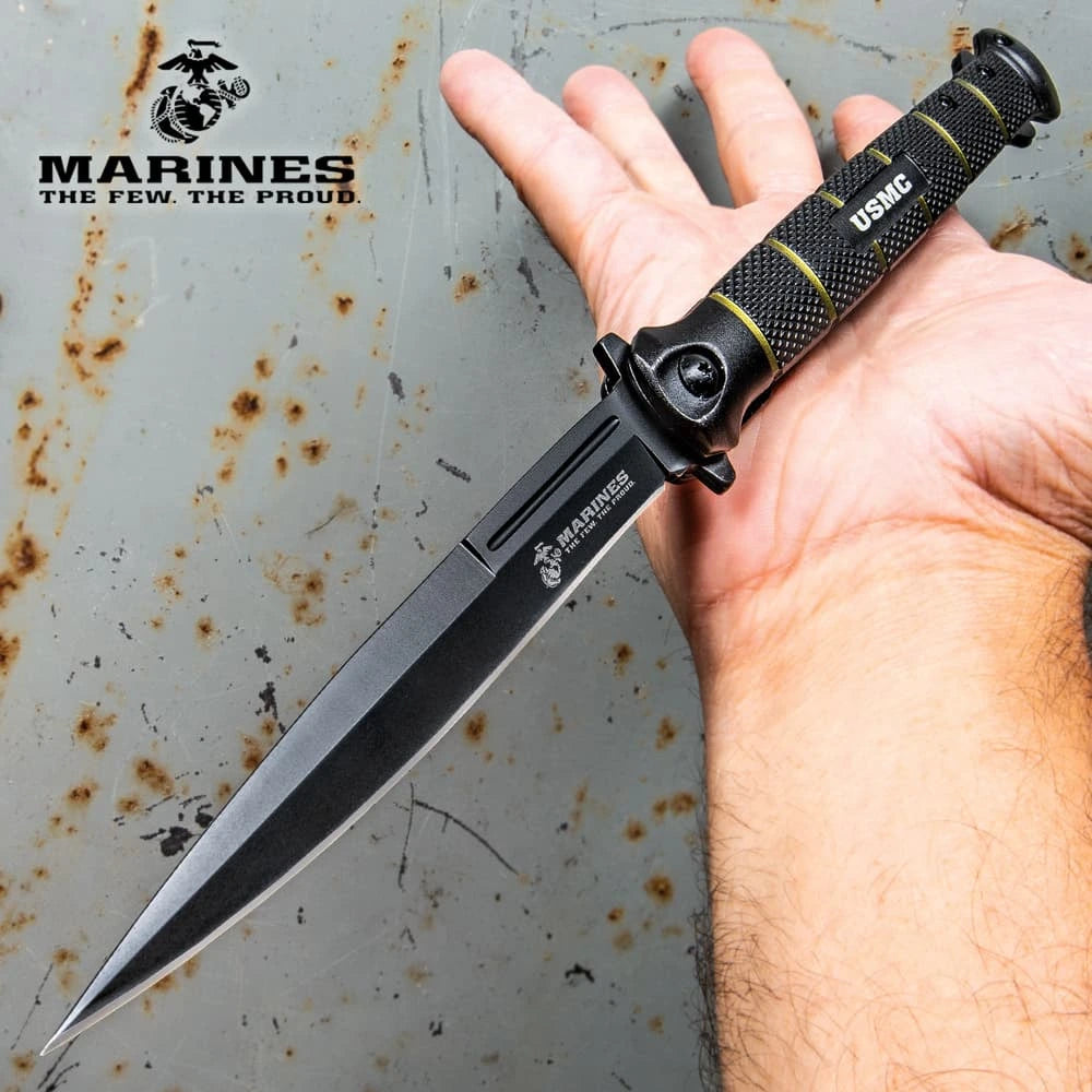 USMC blackout colossal stiletto assisted opening pocket knife closed view with aluminum handle and pocket clip